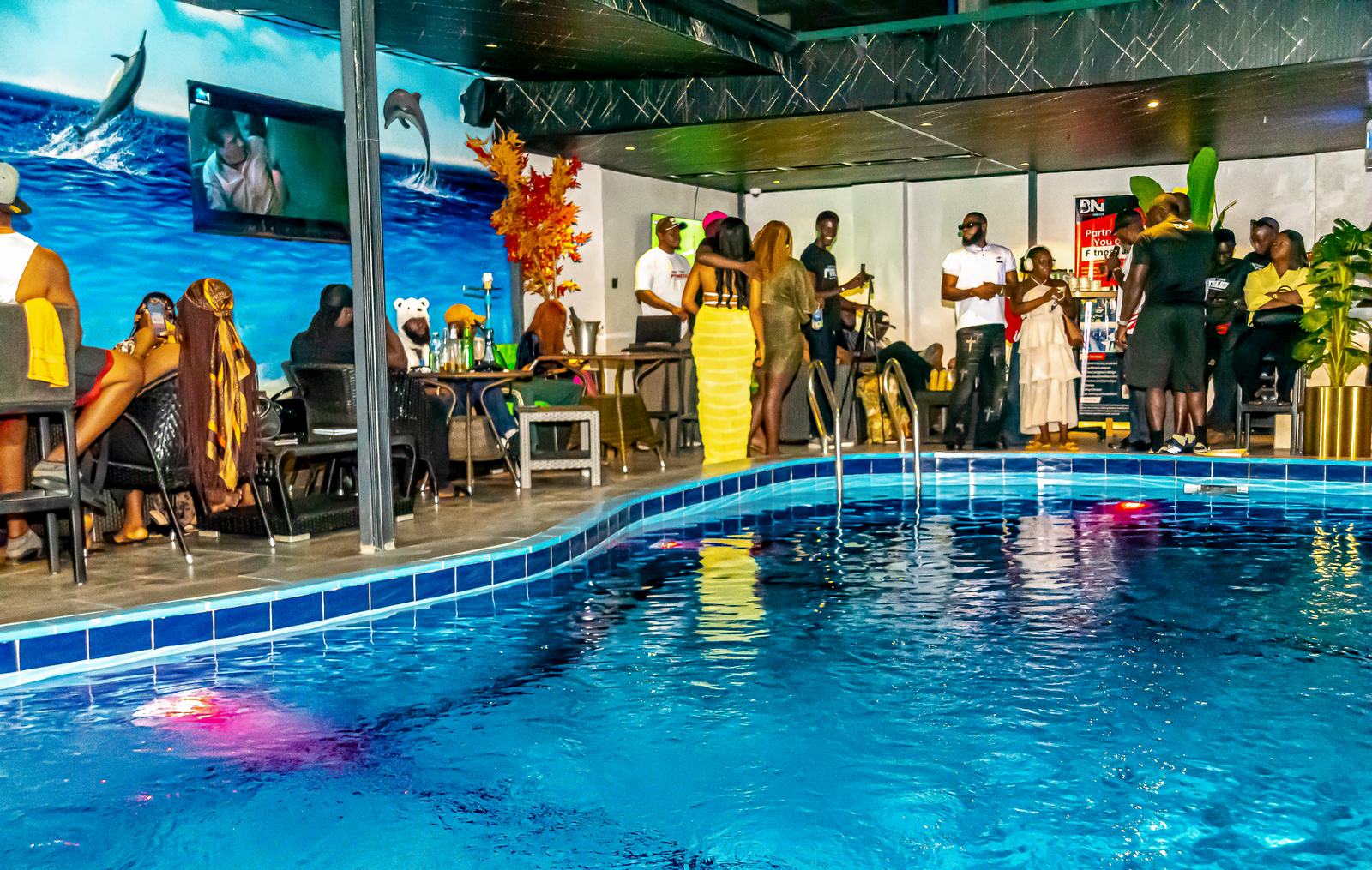 A social occasion around the Arena Continental pool